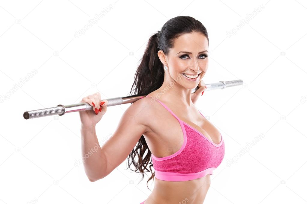 Nice sexy woman doing workout with big dumbbell
