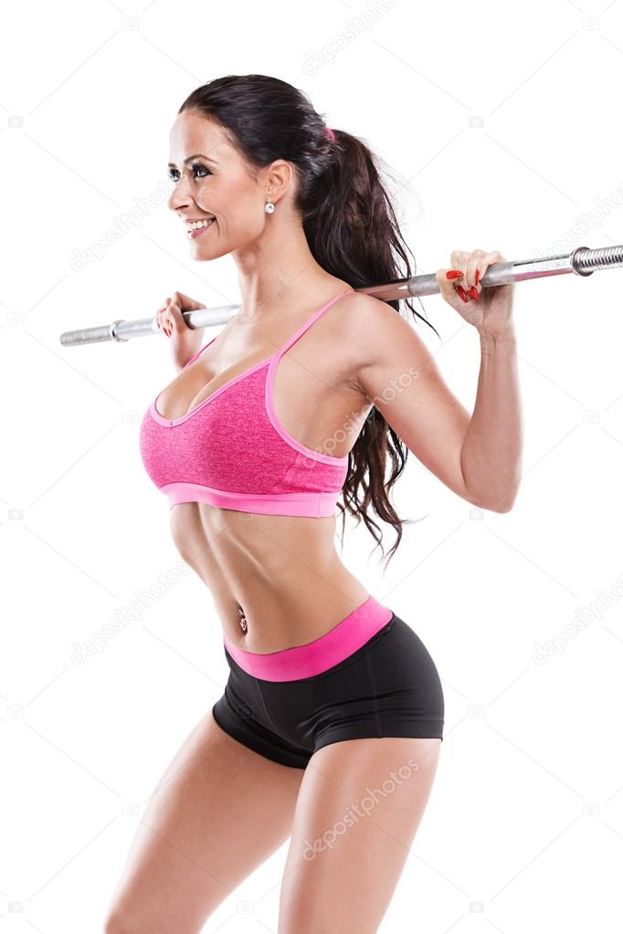 Nice sexy woman doing workout with big dumbbell
