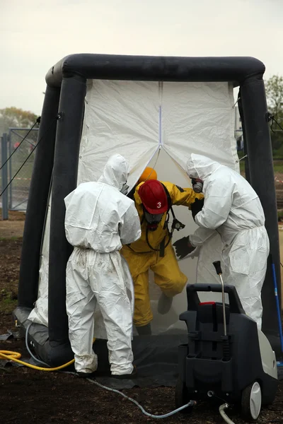 The person in chemical protection suit — Stock Photo, Image