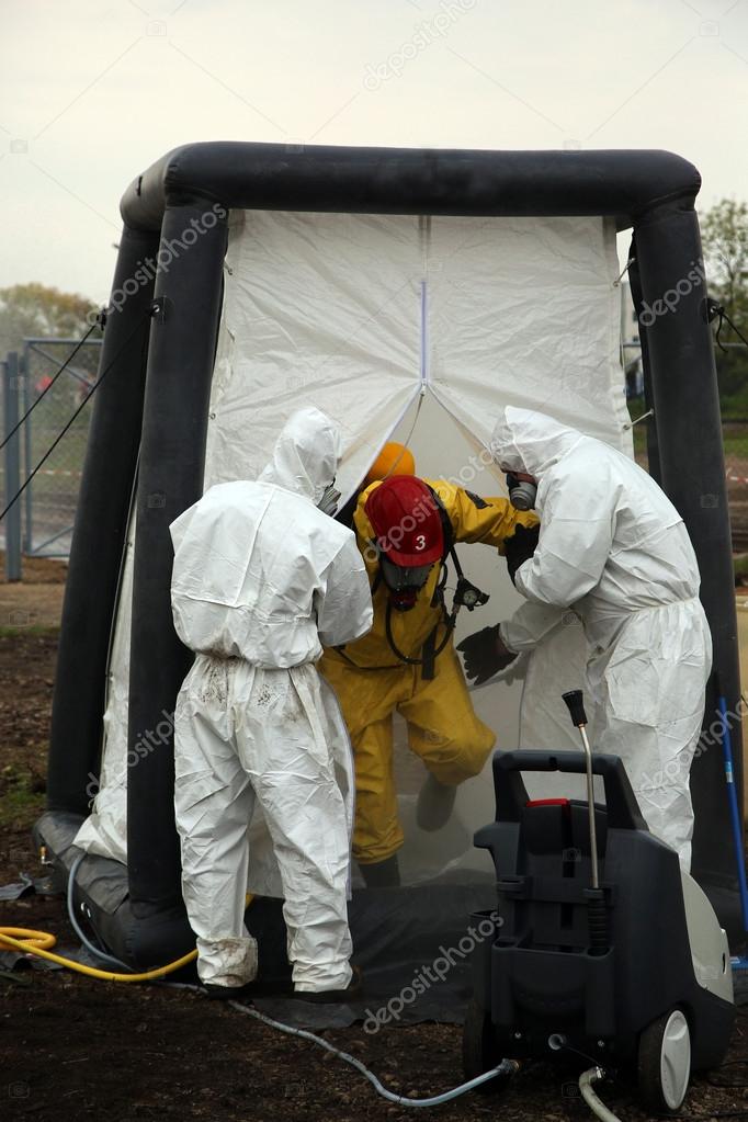 The person in chemical protection suit