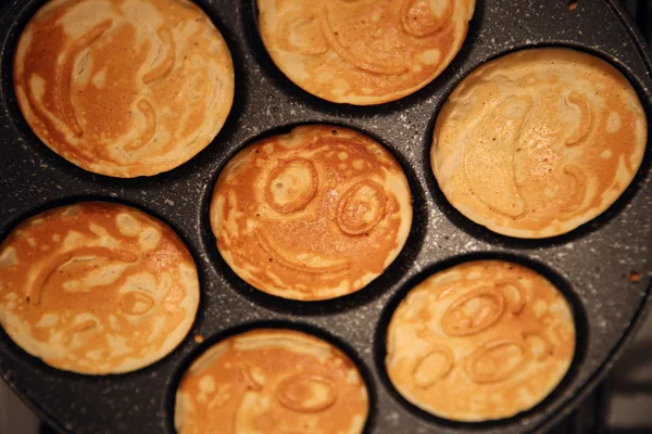 The ruddy pancakes with smiles — Stock Photo, Image