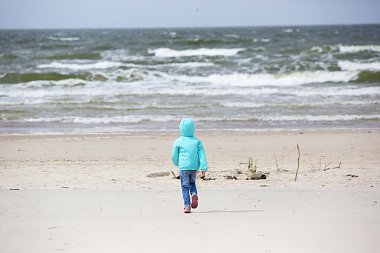 Girl on the sand beach