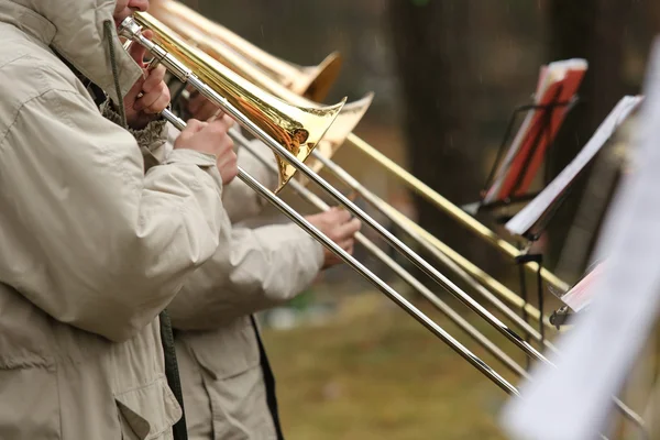 Trumpet play ttrombone — Stock Photo, Image