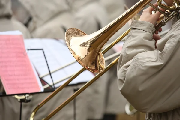 Trumpet play ttrombone — Stock Photo, Image