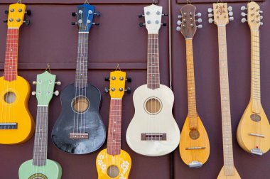 close up of wooden guitars
