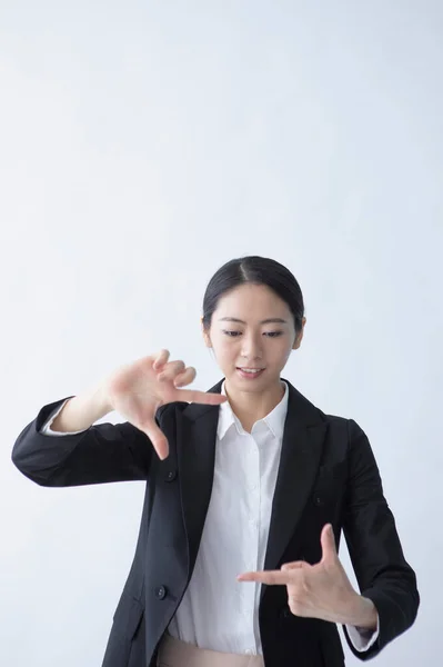 Attractive Asian Businesswoman Gesturing Hands — Fotografia de Stock