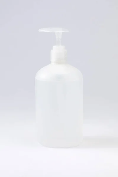 Bouteille Plastique Blanc Avec Distributeur Savon Sur Fond Clair — Photo