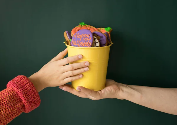 Mother Hand Passes Bucket Filled Gingerbreads Form Pumpkins Child Hand — Stock Photo, Image