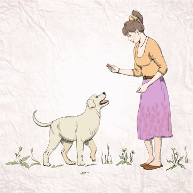 Labrador köpekle oynamayı kadın