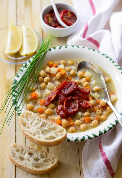 Chickpeas soup with sun dried tomatoes Stock Photo