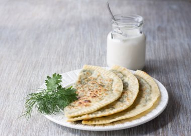 Flat bread with herbs, kutaby, traditional Azerbaijani dish