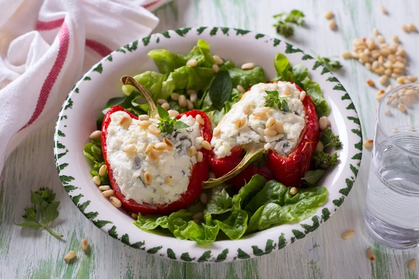 Red sweet peppers stuffed with ricotta, garlic and herbs — Stock Image Red sweet peppers stuffed with ricotta, garlic and herbs Royalty Free Stock Images