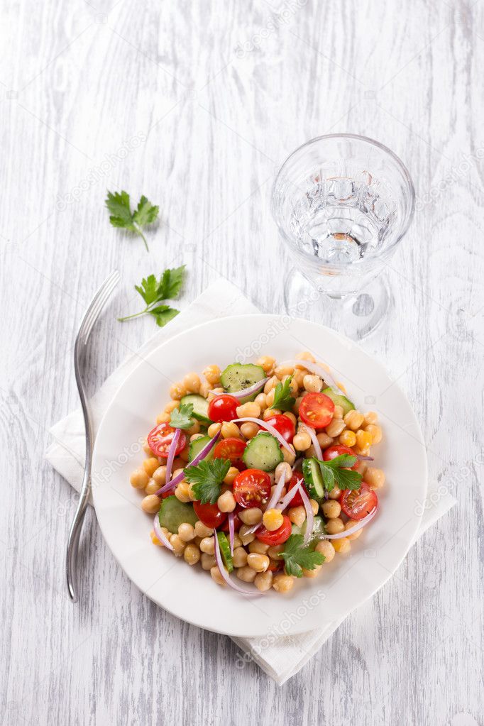 Healthy chickpeas salad with vegetables