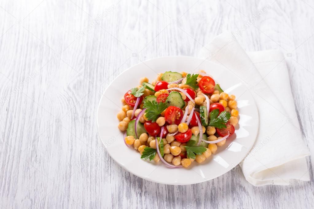 Healthy chickpeas salad with vegetables