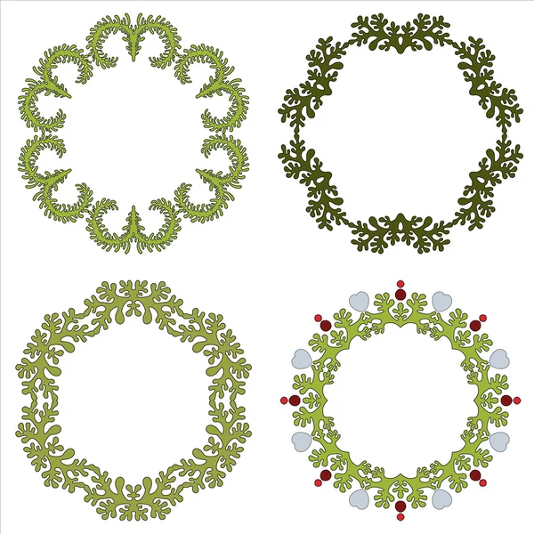 Set of four circular floral frames for your design — Stock Vector