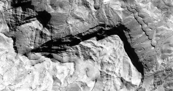 Black and white photo, abstract photography of landscapes of the deserts of Africa from the air,