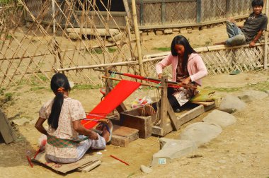 Young women producing textile in Nagaland, India