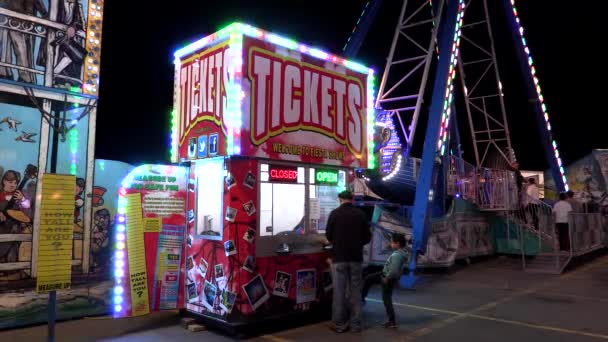 Carnival Arcade Ticket Booth Provides Passes Amusement Park Rides — Stock Video