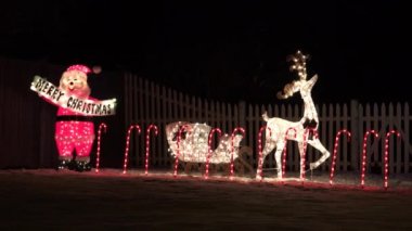 Noel Baba ve Ren geyiği ışıklı Noel dekorasyonu, döngü