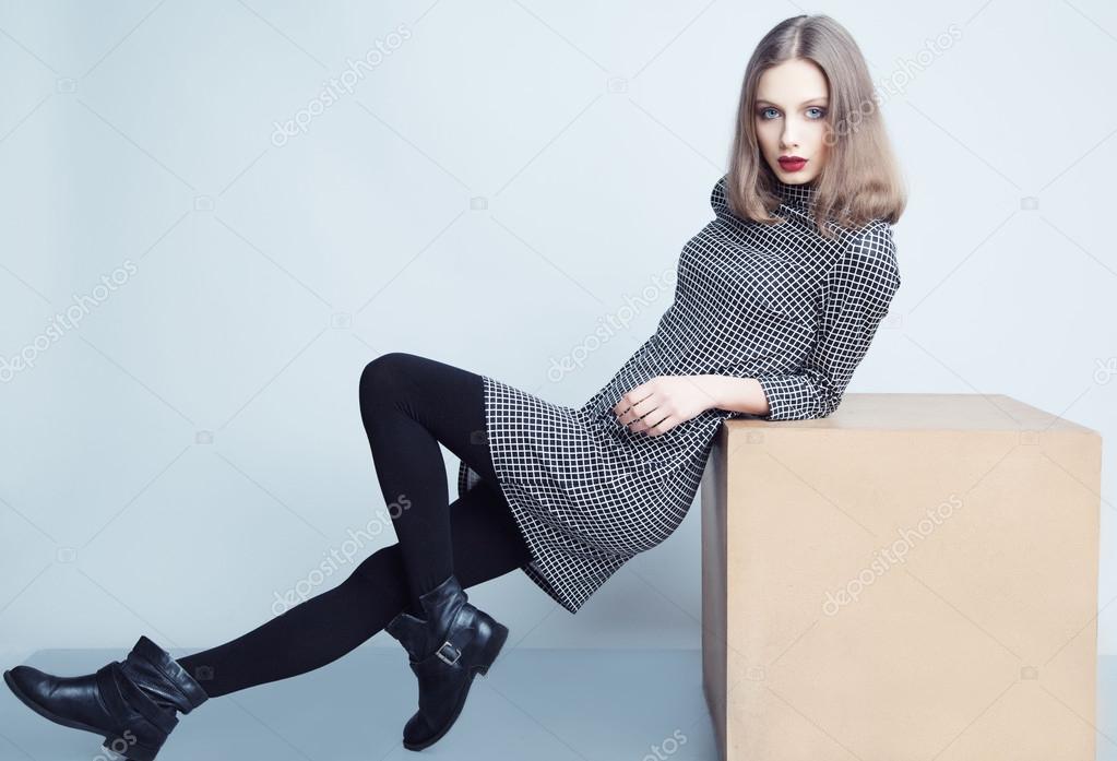 Fashion portrait of young beautiful female model with perfect ma