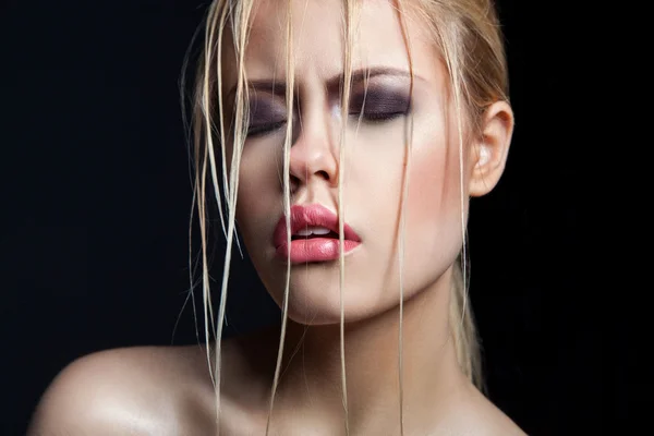 Art beauty portrait of blond woman with cleative fashion make up