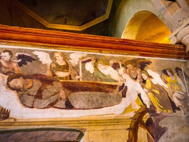 İtalya 'da Maggiore Gölü kıyısındaki Aziz Catherine Hermitage. Maggiore Gölü' ndeki bir gemi enkazı sırasında boğulan bir tüccar, İskenderiyeli Aziz Catherine 'e dua etti. Ona yardım etmek için geldi.