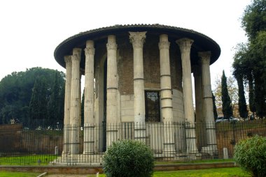 The Temple of Hercules by the banks of the Tiber in Rome Italy clipart