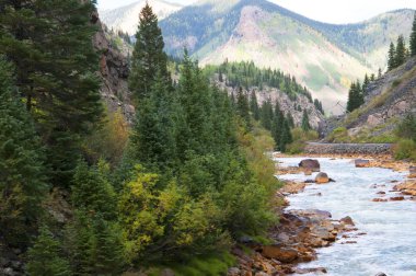 The Rocky Mountains with the River Animas  in Colorado USA clipart