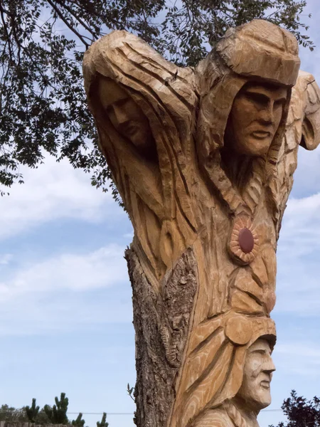 Carved Tree Artwork in Garden of Hotel in Taos New Mexico