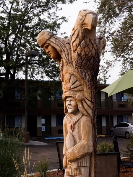 Carved Tree Artwork in Garden of Hotel in Taos New Mexico