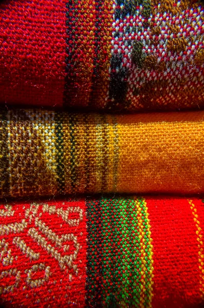 Stock photo of handmade blankets in street market in Purmamarca village , Jujuy, Argentina