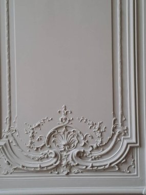 white wall with a pattern of a window