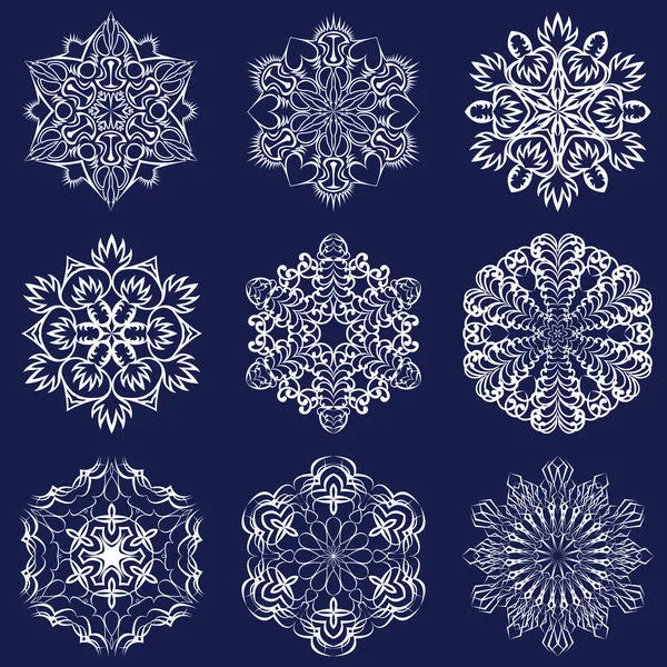 Conjunto de copos de nieve para el diseño de invierno de Navidad — Vector de stock
