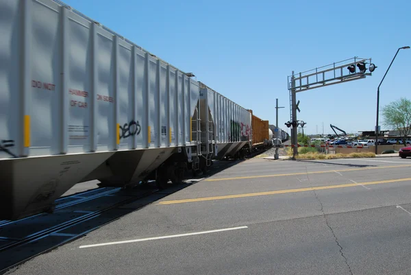Train passing through crossing — Stock Photo, Image