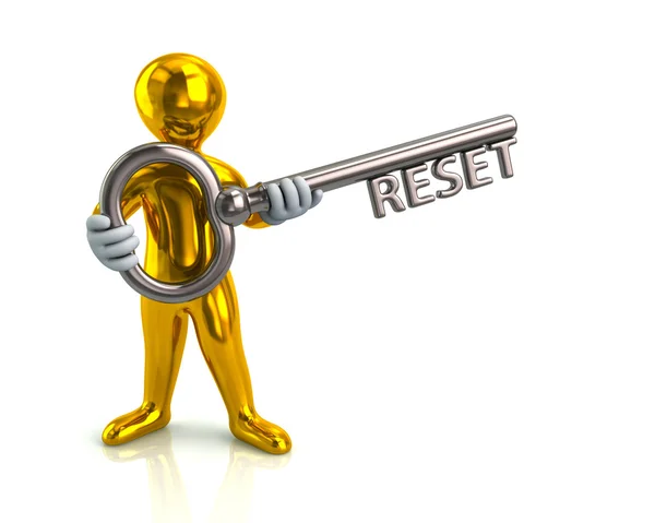 Man holding key with reset word — Stock Photo, Image