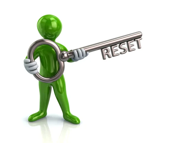 Man holding silver key with reset — Stock Photo, Image