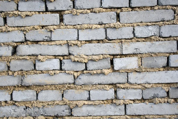 Parede de tijolo cinza — Fotografia de Stock