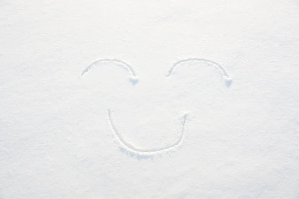 Smiley-Gesicht im Schnee — Stockfoto