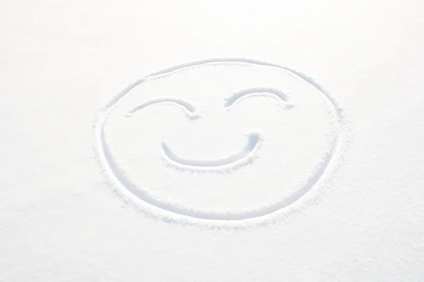 Smiley-Gesicht im Schnee — Stockfoto