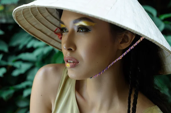 Girl in a three-cornered hat looking away — Stock Photo, Image