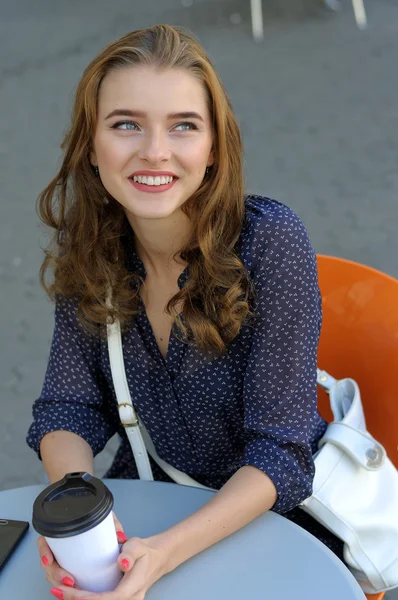 Top view of a girl who is sitting at a table — Stock Photo, Image