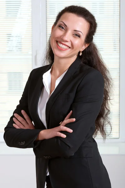 Woman laughs with folded her hands — Stock Photo, Image