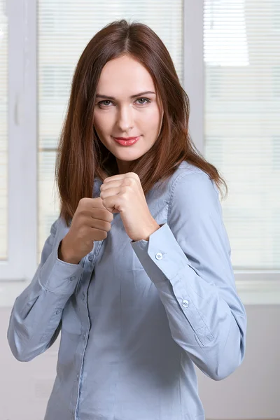 Girl is standing in a pose of a boxer — Stock Photo, Image