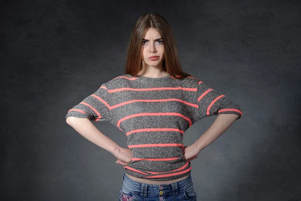 Anger side, a charge concept. Woman standing with hands on hips — Stock Photo, Image