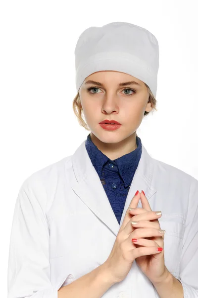 Medical doctor in a white robe folded hands — Stock Photo, Image