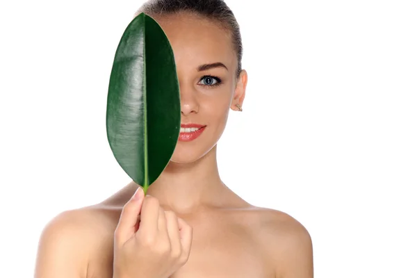 Happy woman with green leaf — Stock Photo, Image
