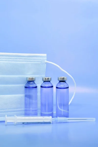 Transparent Medical Ampoules Syringe Protective Mask Light Blue Background Concept — Stock Photo, Image