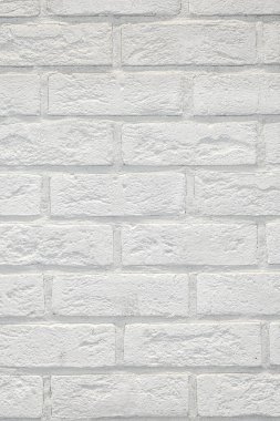 Beyaz tuğlalı arka plan. Eski beyaz tuğla bir duvar nötr. Kaya dokusu. Duvar dekorasyonu için dekoratif fayanslar. Beyaz dekoratif tuğla. Çatı katı dekoru. Yapısal yüzey taklit tuğla