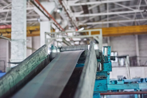 Rolling mill machine for rolling steel sheet