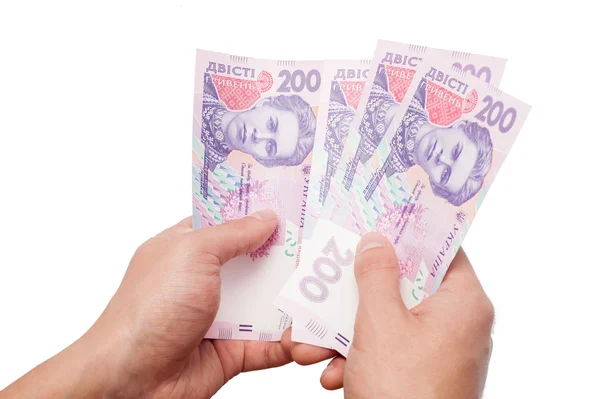 Ukrainian money in hand — Stock Photo, Image